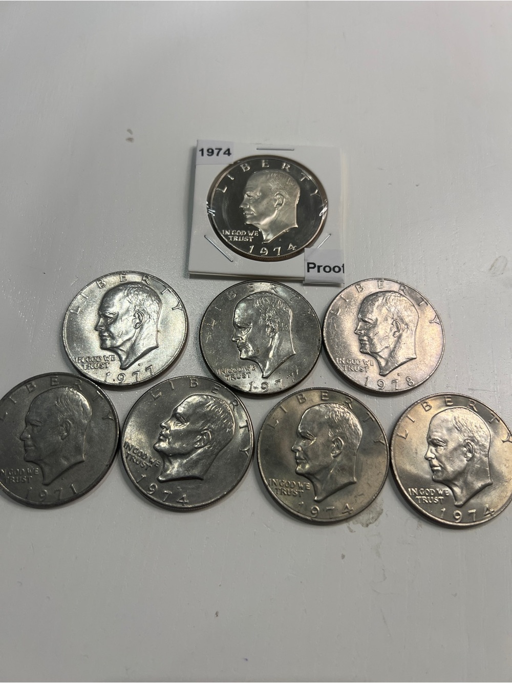 1974 Eisenhower / Ike Dollar 8 coin - One proof / One rainbow tuned